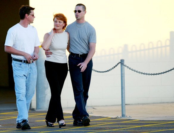 Pauline Hanson walks with her sons Tony, left, and Steven Zagorski in 2003.