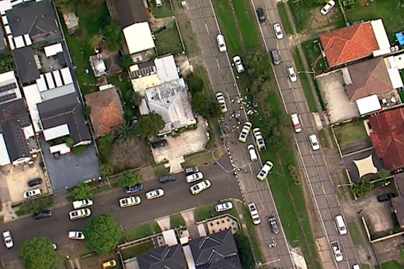 Aerial footage of emergency vehicles at the scene in Cabramatta after the crash. 