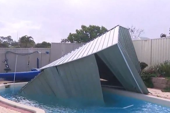 A shed landed in a neighbour’s pool.