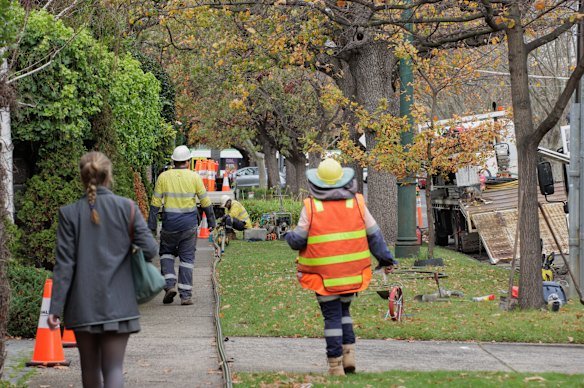 A steady stream of tradies arrive at St George’s Road, Toorak, where more than $250 million worth of residential renovations are transforming the leafy boulevard. 