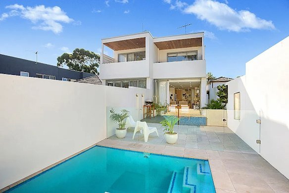 Kim Sarkin moved into this Rose Bay house in August last year and is yet to pay the rent.