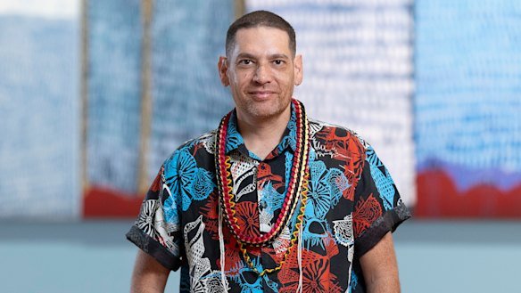 Tony Albert, pictured in front of his work After The Rain.