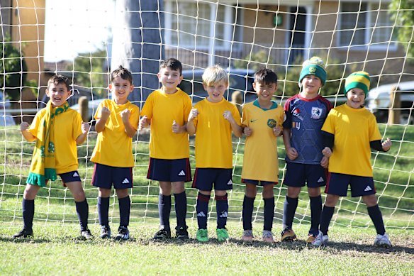 The Under-7 Blue OLQP Falcons cheer on the Socceroos before their opening game of the 2026 World Cup against Turkey. From left: Zachary, Aidan, Isaac, Jesse, Ethan, Maxwell and Roman. 