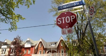Police tackle Toronto cyclist after he allegedly blew through stop sign