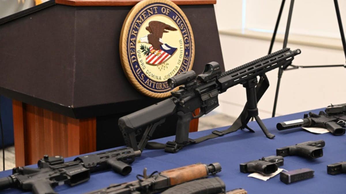 Firearms on a table.