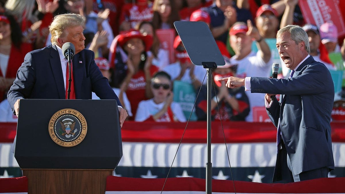 Nigel Farage and Donald Trump standing together at a campaign rally in Goodyear, Arizona.