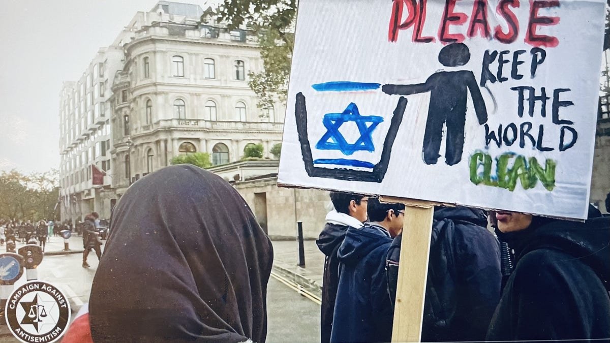 Antisemitic signs displayed at an anti-Israel protest in London