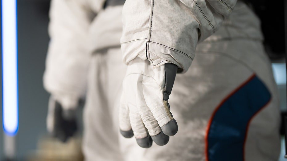 white close up of spacesuit 
