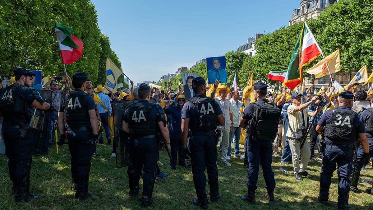 Supporters of the National Council of Resistance of Iran gather in Paris