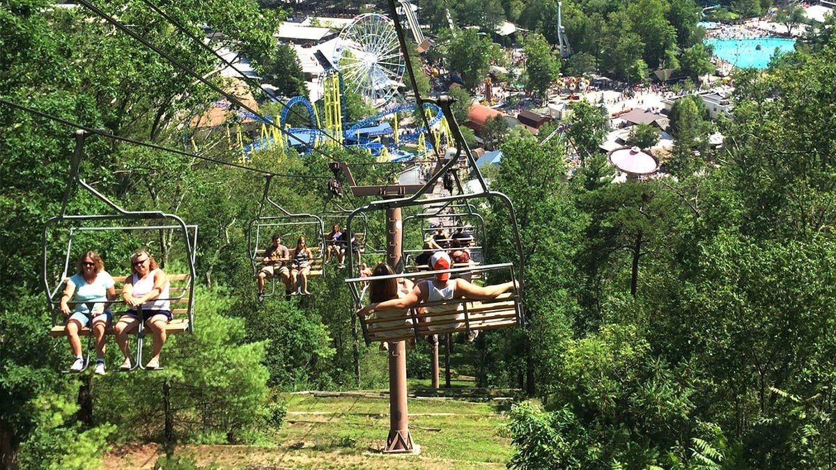 View of parkgoers in chairlift