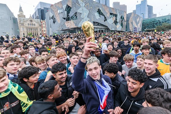 Rowdy fans sang and chanted before the big match. 