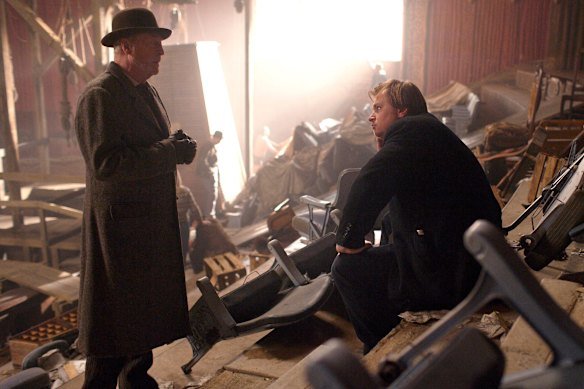 Christopher Nolan with Michael Caine (left) for 2009’s The Prestige, one of their many collaborations.
