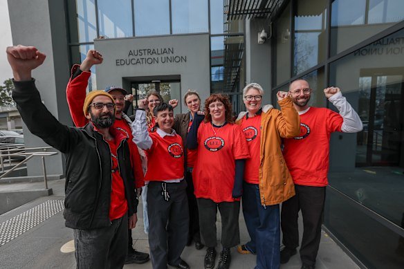 Members of the Australian Education Union’s branch council, including Lucy Honan (second from right), celebrate the rejection of the government’s pay offer on Friday morning.