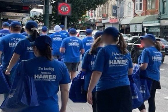 Brethren members wearing Liberal candidate T-shirts in the seat of Kooyong during the 2025 campaign.