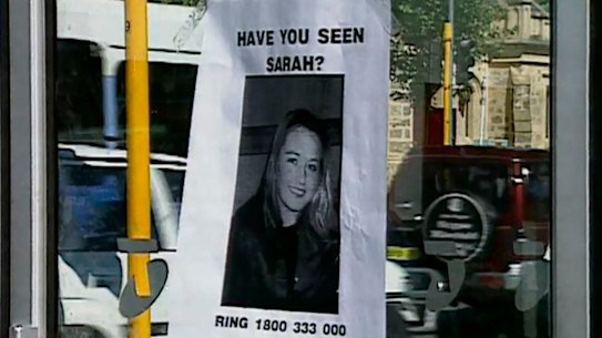 A missing person poster on the public phone booth where Sarah Spiers called for a taxi before she vanished. 