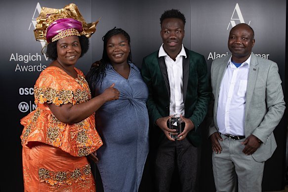 Nestory Irankunda with (from left) his mother, Dafroza, his sister Susana and his father, Gideon, at Adelaide United’s club awards in 2023.