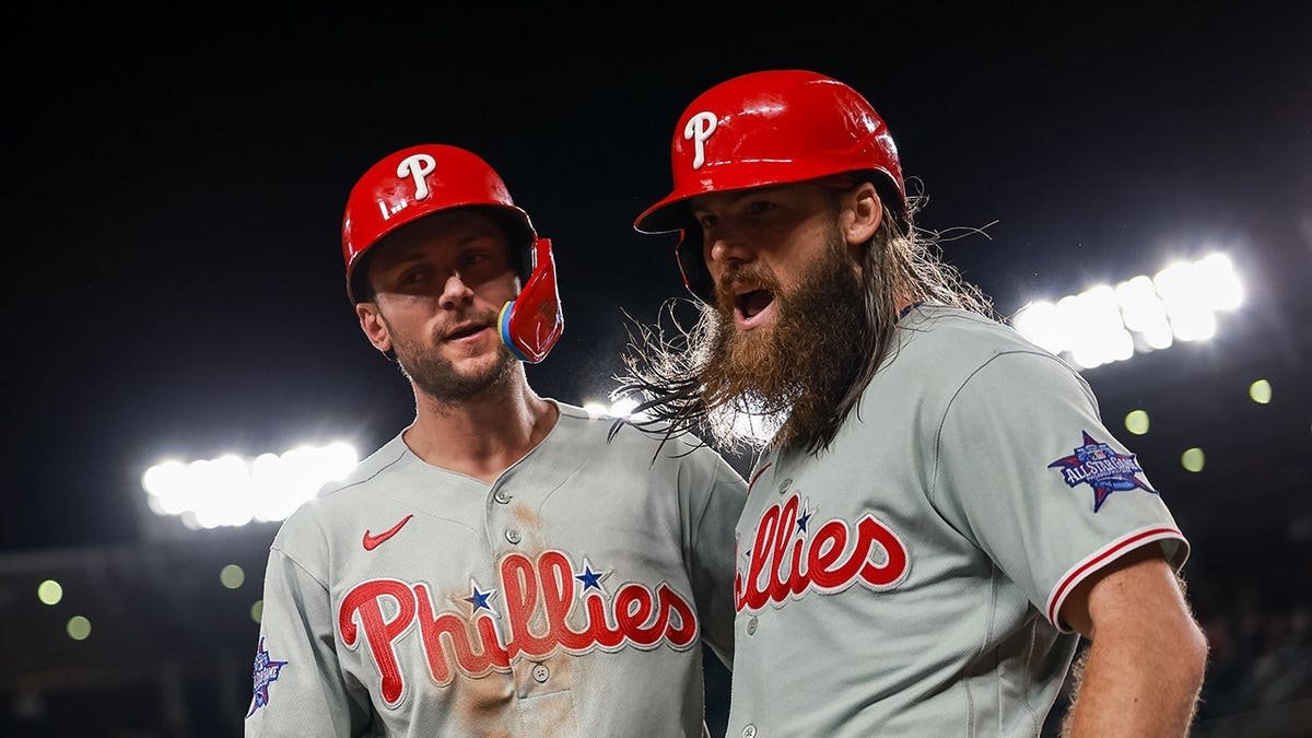 Brandon Marsh and Trea Turner celebrating at Nationals Park in Washington, D.C.