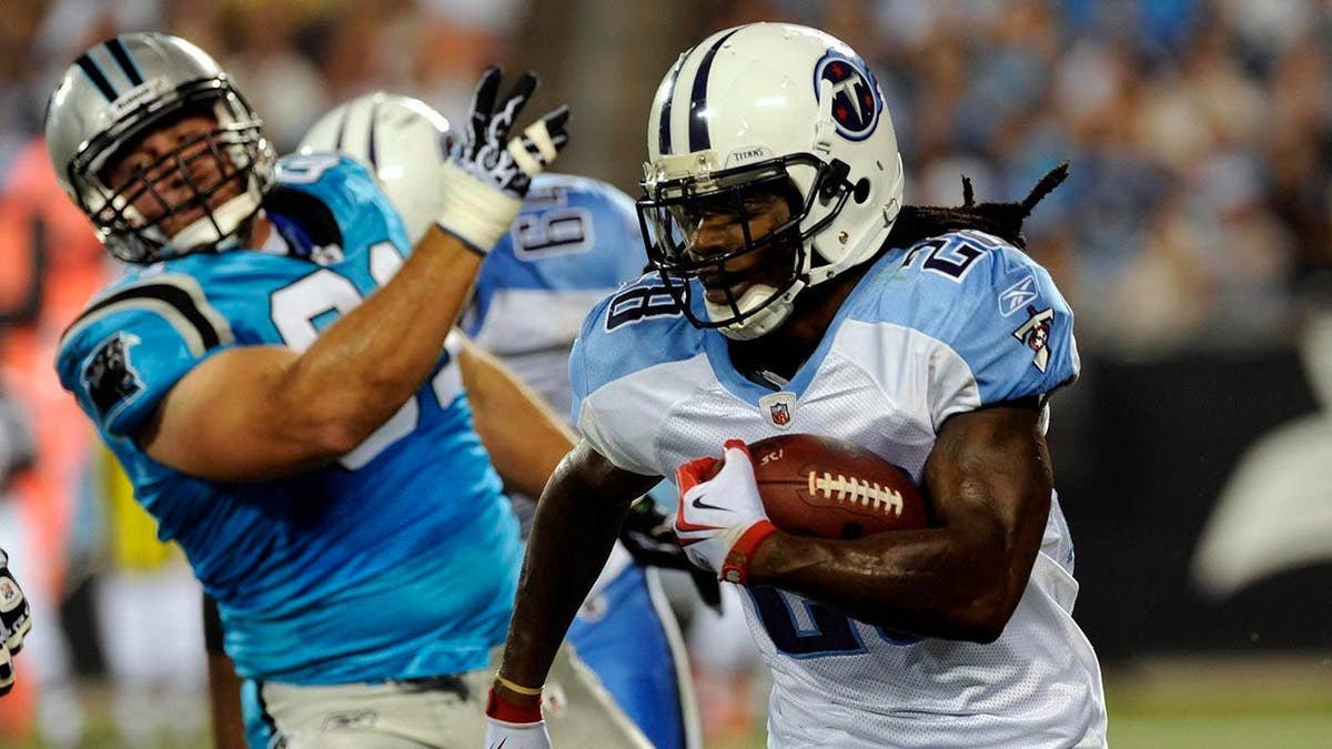 Chris Johnson running with football against Carolina Panthers at Bank of America Stadium