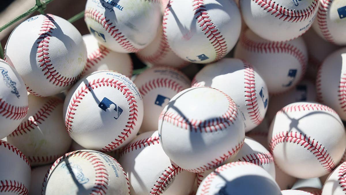 Close up of baseballs on field before Colorado Rockies and Philadelphia Phillies game
