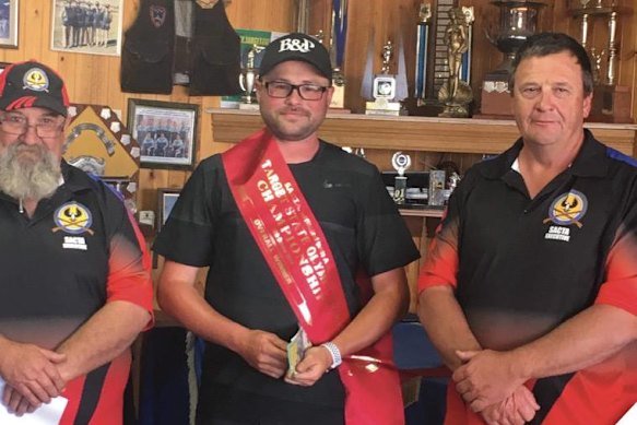 Trent Bowden (centre) at a clay target shooting competition in 2018.