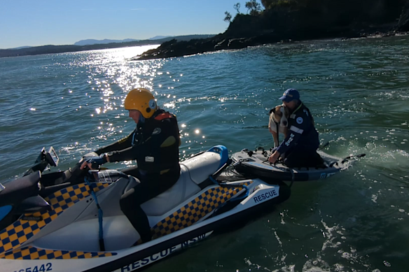 The dog is returned to the main rescue vessel before being taken back to Batemans Bay.