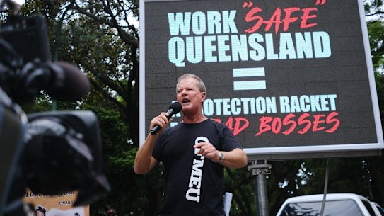 Former Queensland state secretary Michael Ravbar speaks to protesters outside state parliament in February 2024.