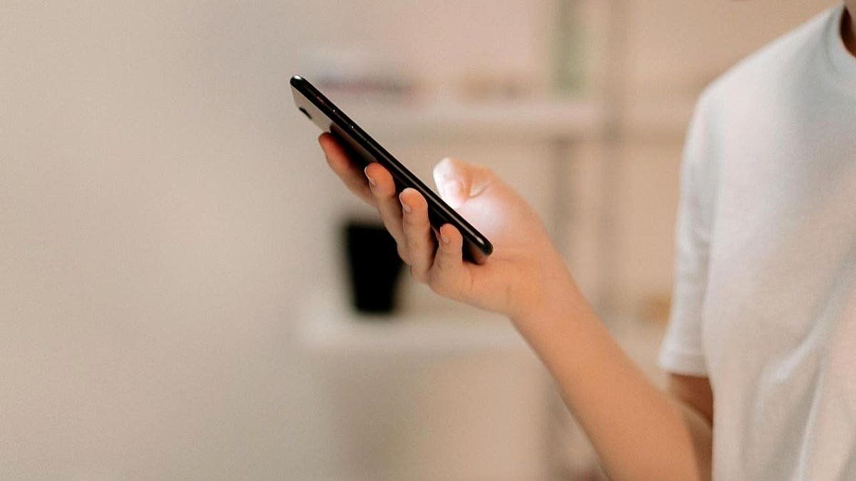 A person holding a phone