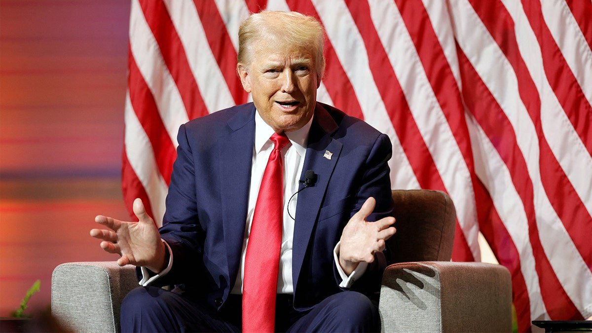Donald Trump answering questions at the National Association of Black Journalists convention in Chicago