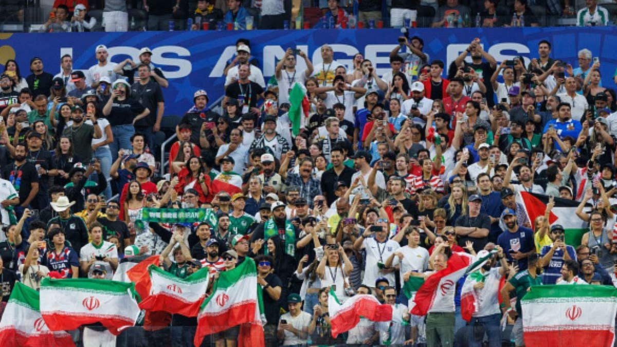 Iran fans celebrate wildly as their team battles New Zealand to a World Cup draw (Photo by Liza Rosales/ISI Photos/ISI Photos via Getty Images)