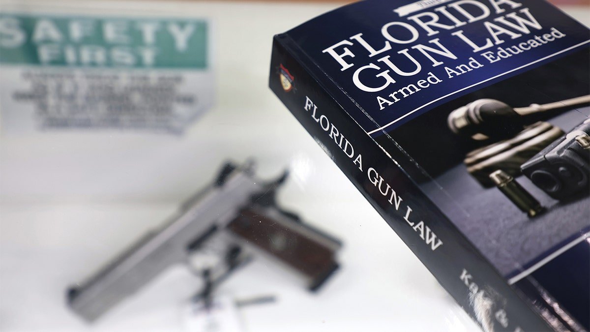 A Florida gun law book displayed at Top Shottas Guns and Tactical Supply store in Fort Lauderdale
