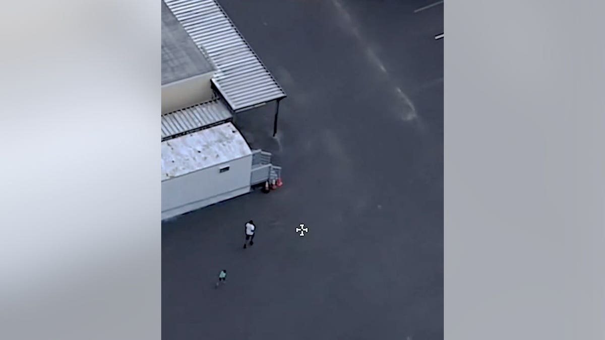 man and child running