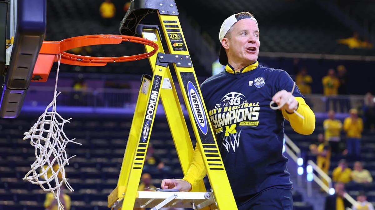 Michigan head coach Dusty May led the Wolverines to a national title in his second season. (Photo by Gregory Shamus/Getty Images)