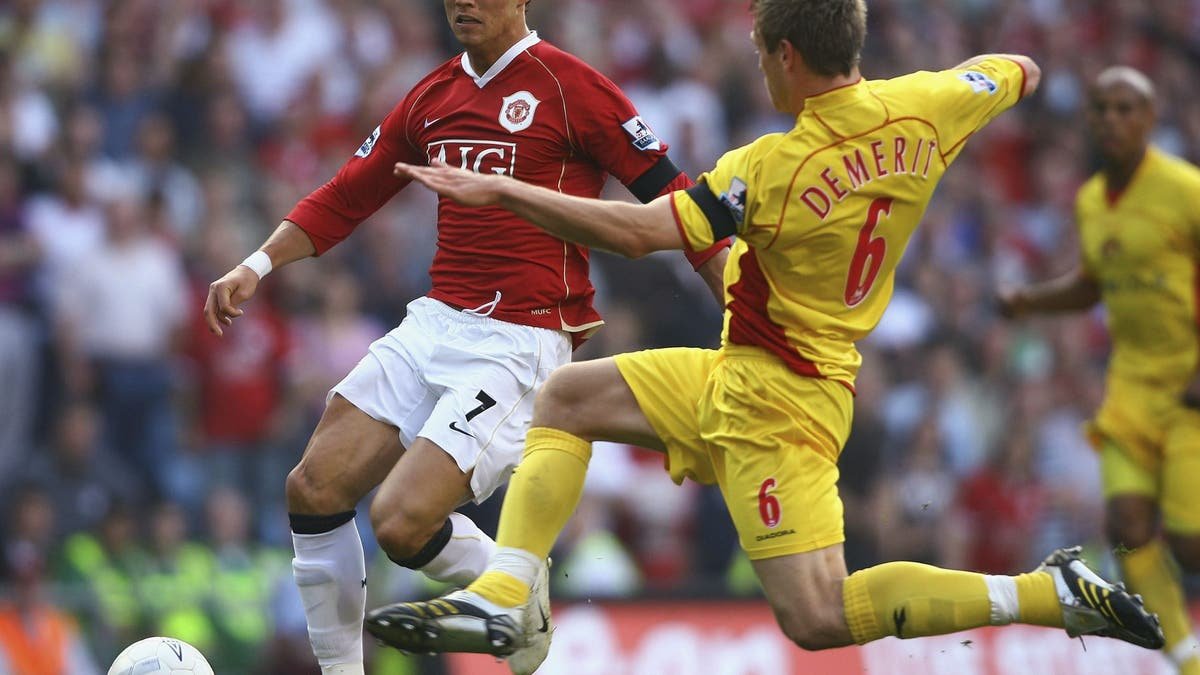 Cristiano Ronaldo anticipates a tackle from Jay Demerit during a 2007 FA Cup semifinal. (Stu Forster/Getty Images)
