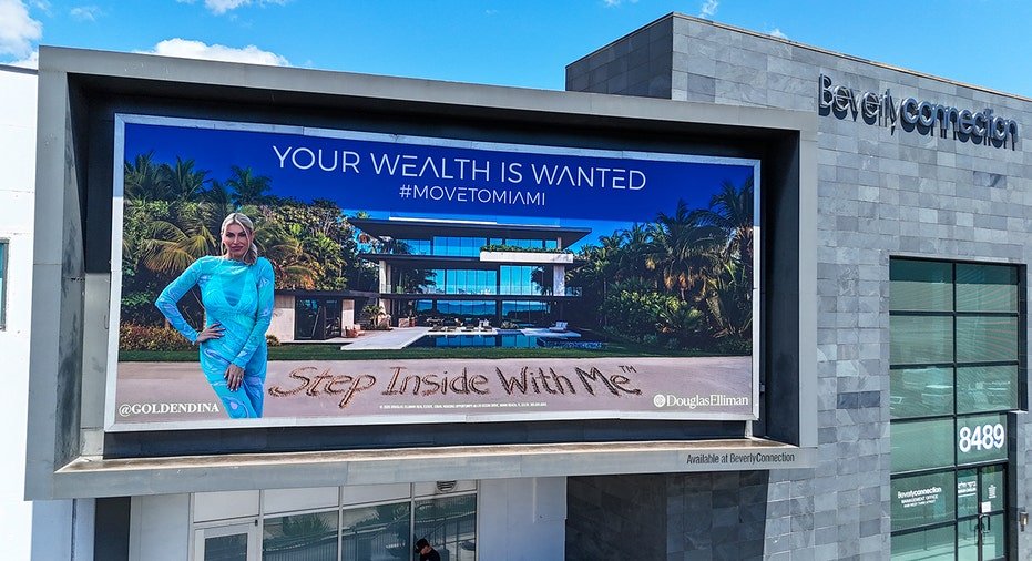Dina Goldentayer on billboard