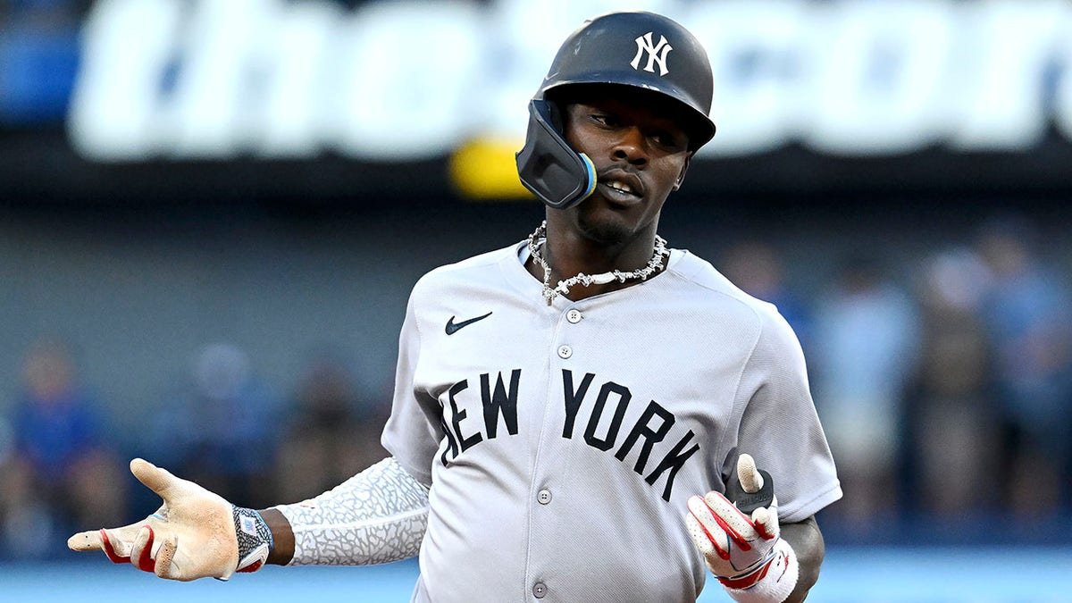 New York Yankees' Jazz Chisholm Jr. rounding bases after hitting home run