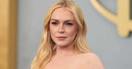 Lindsay Lohan Wears These Comfy White Sneakers on Set — Get Her Exact Pair