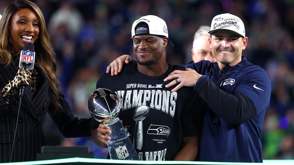 Seattle Seahawks head coach Mike Macdonald and running back Kenneth Walker III holding Vince Lombardi trophy at Levi's Stadium
