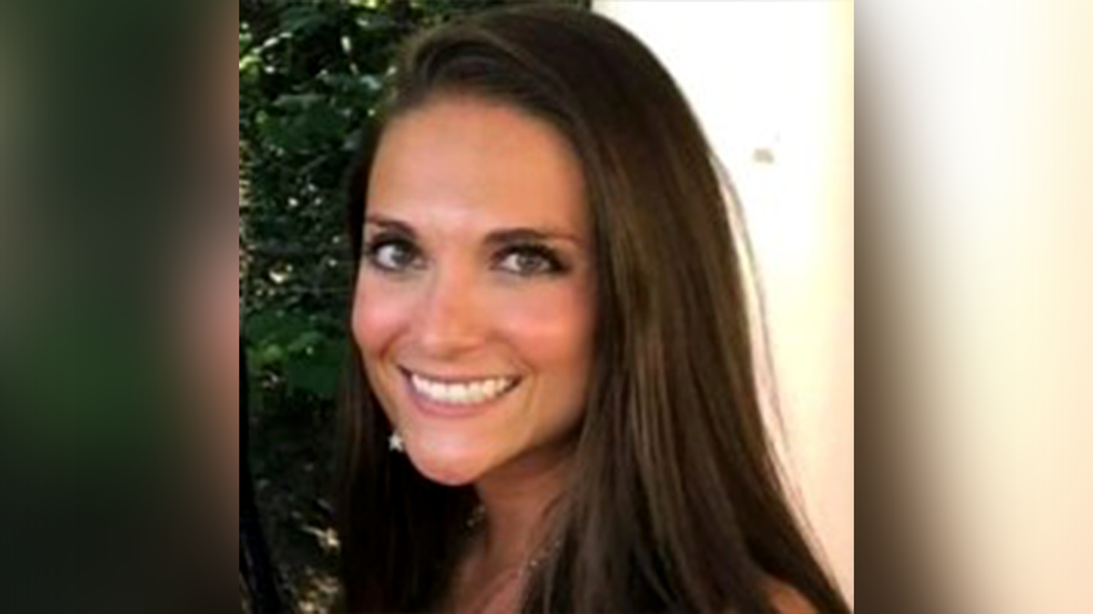 Ashley A. Fisler standing and speaking in a courtroom setting
