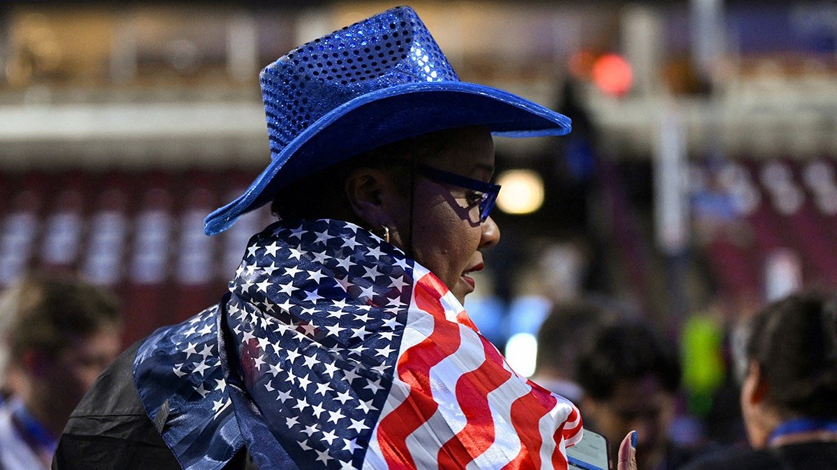 Regina Wallace-Jones wearing a U.S.-flag themed outfit