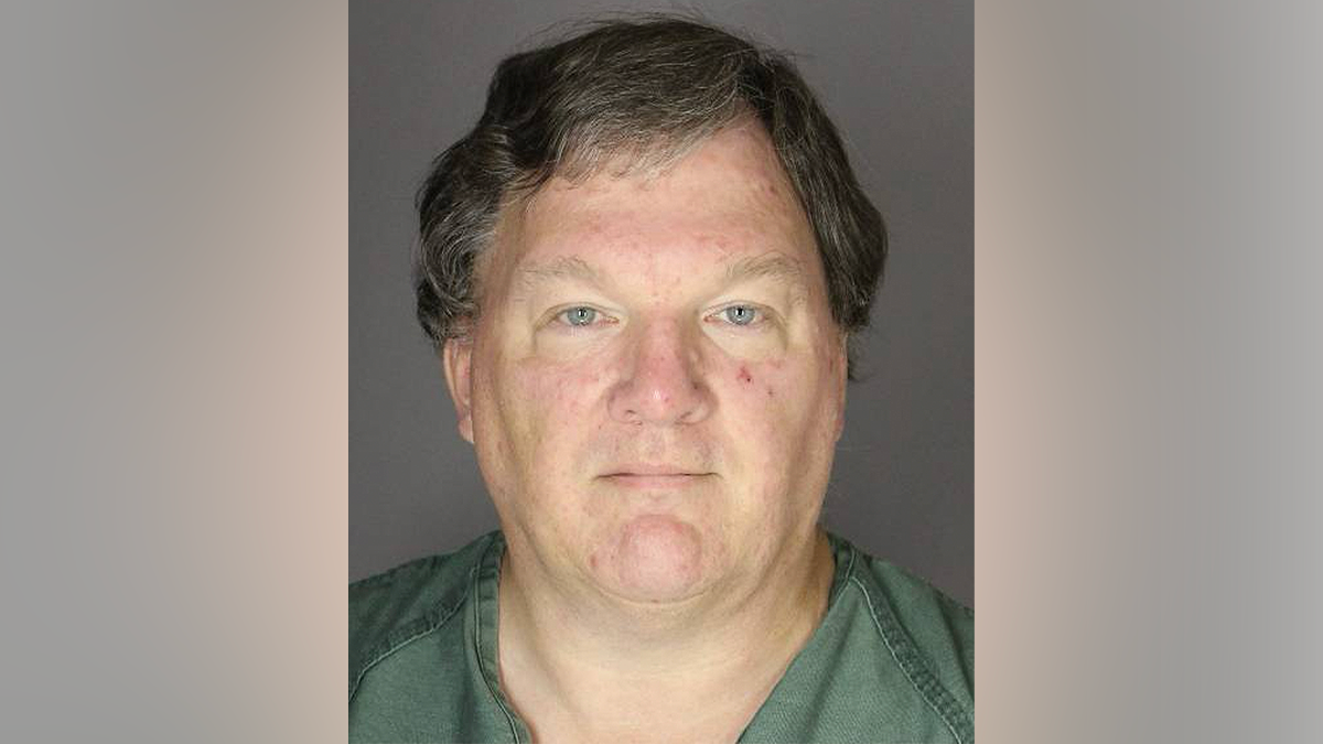 Mugshot of convicted Gilgo Beach serial killer Rex Heuermann wearing a jail uniform