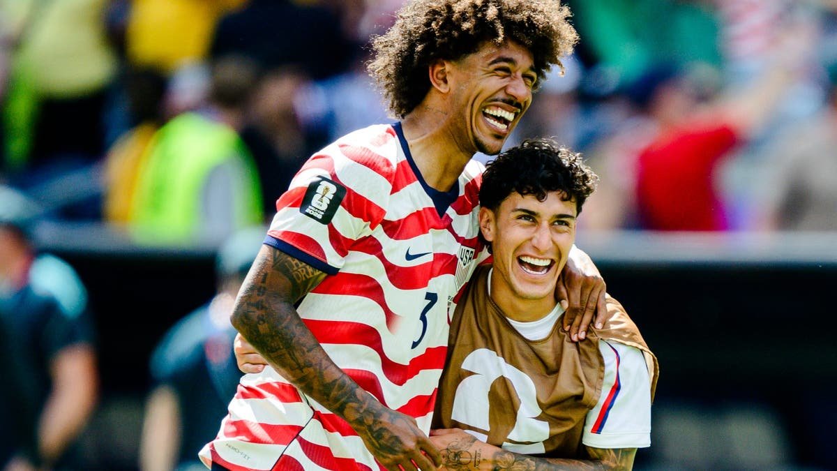 Chris Richards, along with reserve Alex Zendejas, after the USA's win over Australia. (Photo by Jane Gershovich/ISI Photos/ISI Photos via Getty Images)