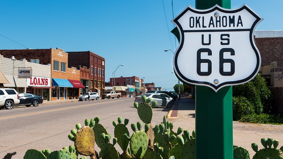 Oklahoma US 66 road sign along historic Route 66 highway.