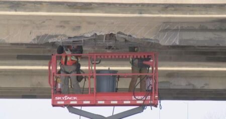 Semi-truck driver who struck Saskatoon overpass fined more than K