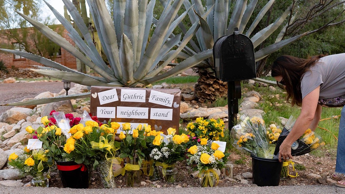 Nancy Guthrie placing flowers outside her home in Catalina Foothills Tucson Arizona