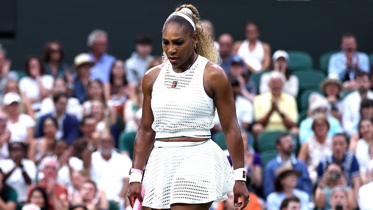 Serena Williams looking on during a tennis match against Maya Joint at Wimbledon.