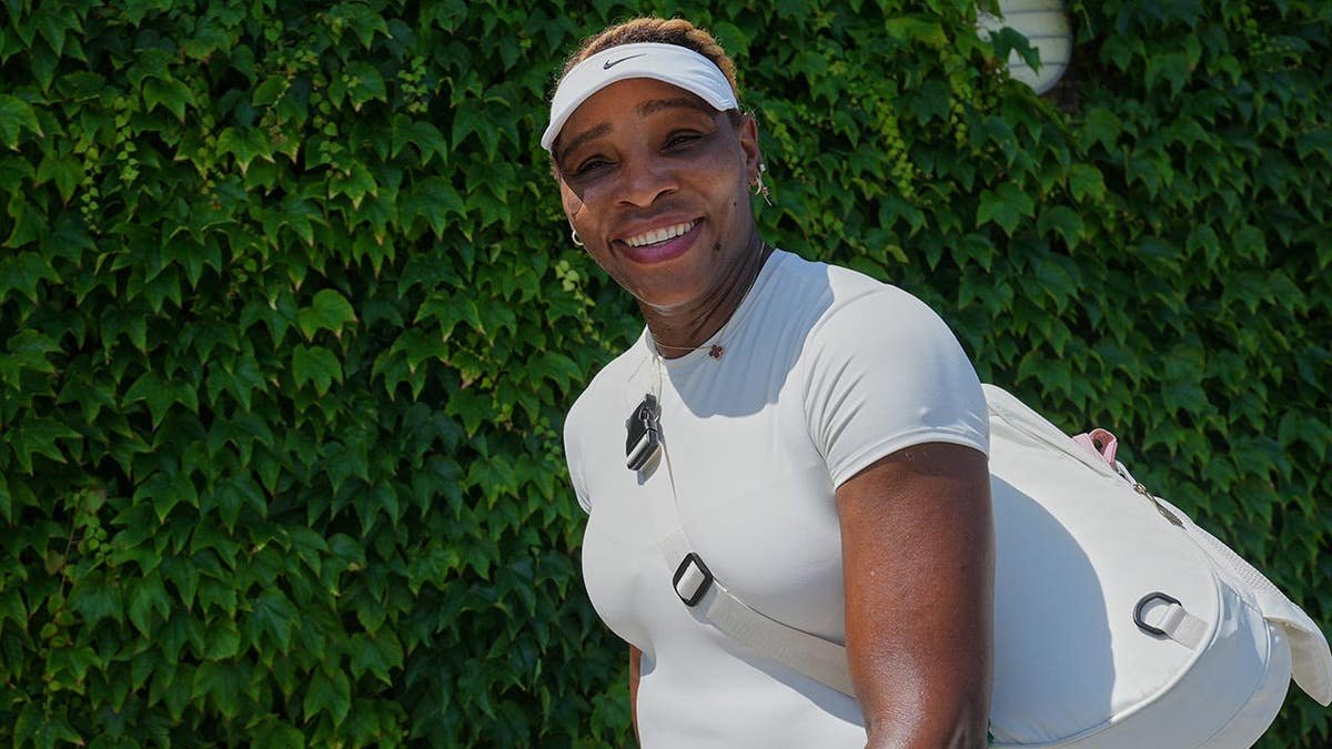 Serena Williams smiling after a training session at the All England Lawn Tennis and Croquet Club