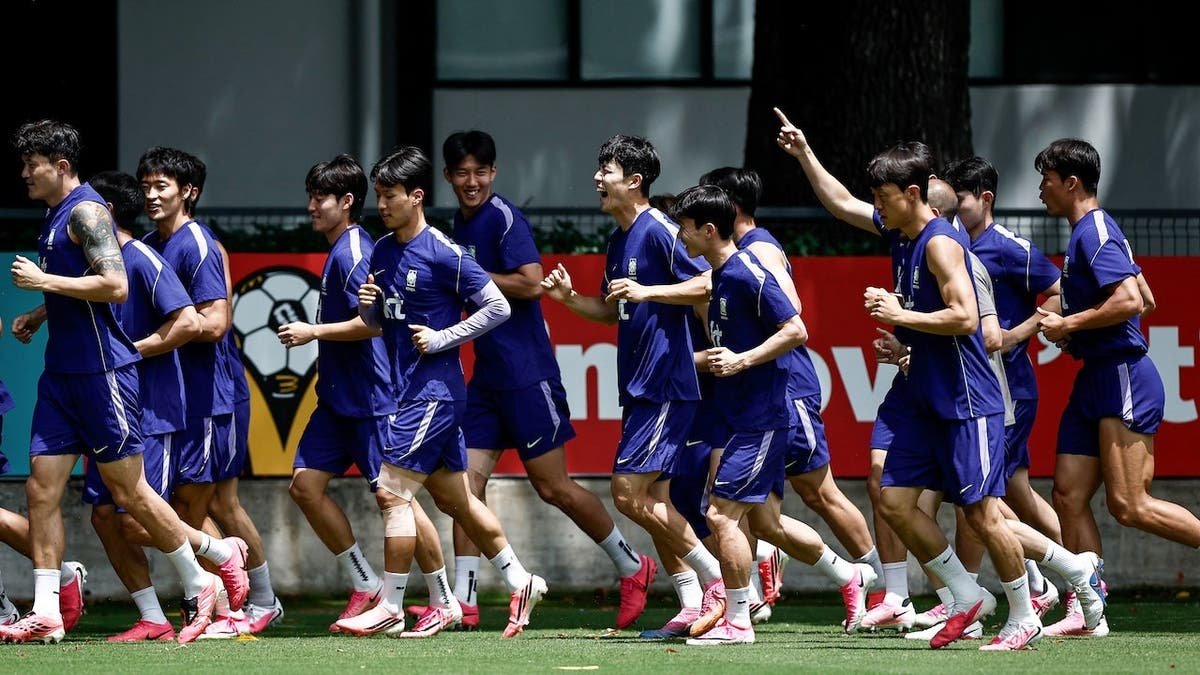 South Korea players training on a grass field at Chivas Verde Valle in Guadalajara