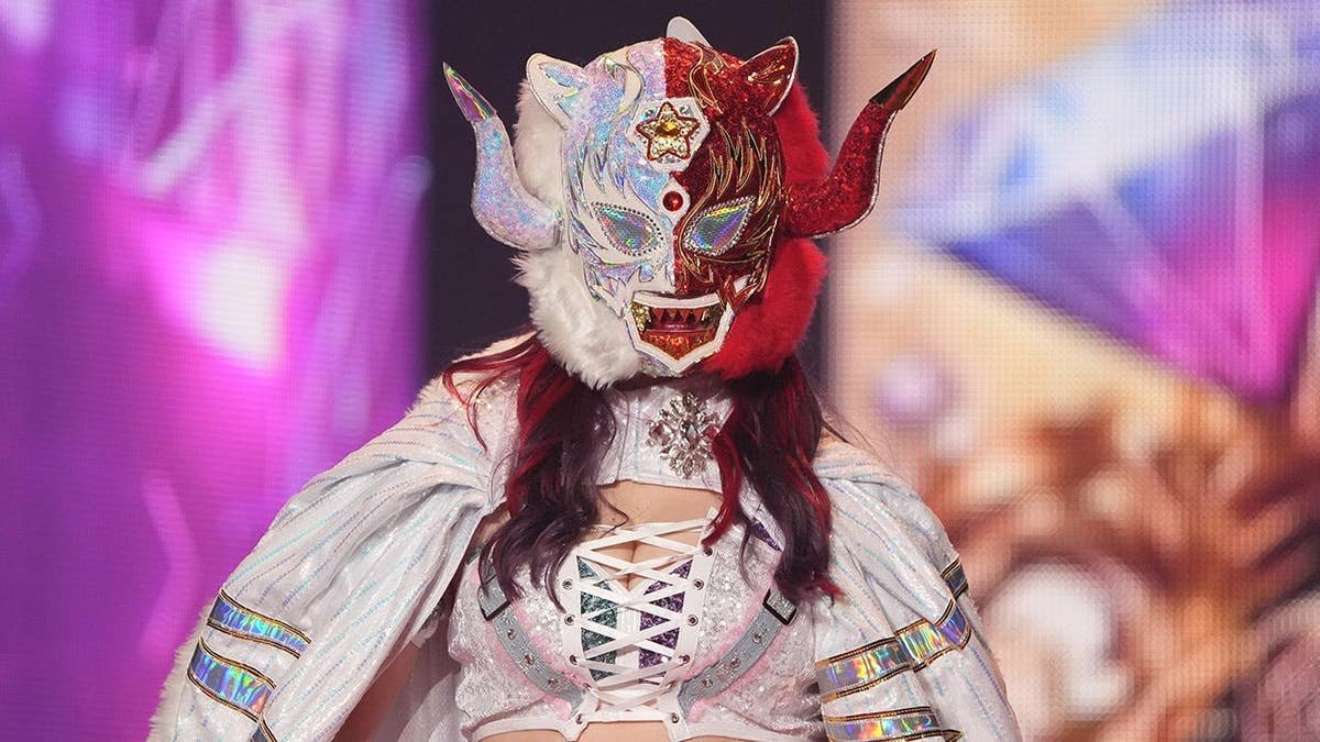 Starlight Kid entering the ring during a women's pro-wrestling event in Osaka, Japan.