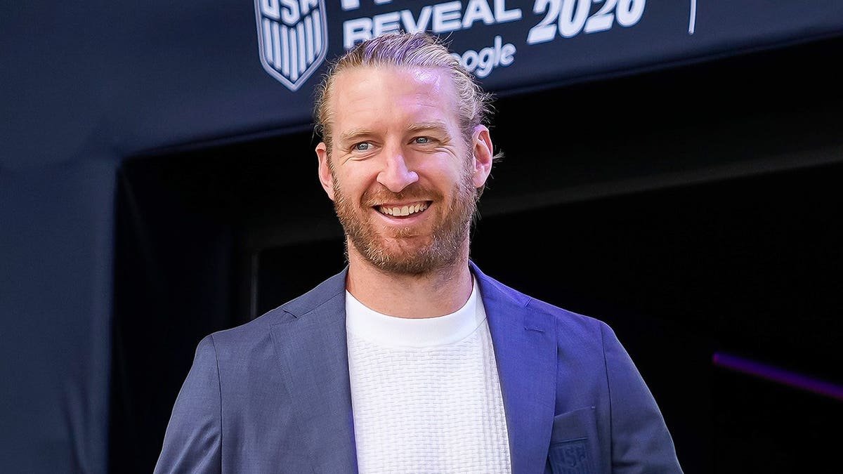 Defender Tim Ream holding a jersey during US men's national soccer team roster announcement in New York City