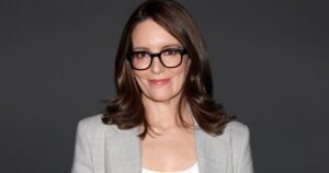 Tina Fey Made the ‘It’ Girl Red Sweater Trend Work for Summer, and Now We Want One Too Tina Fey Made the ‘It’ Girl Red Sweater Trend Work for Summer, and Now We Want One Too